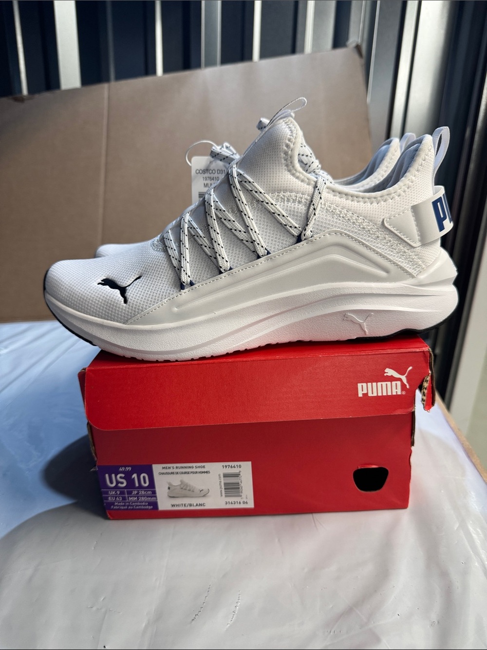 Puma White Athletic Lace-Up Trainer with Black Puma Logo
